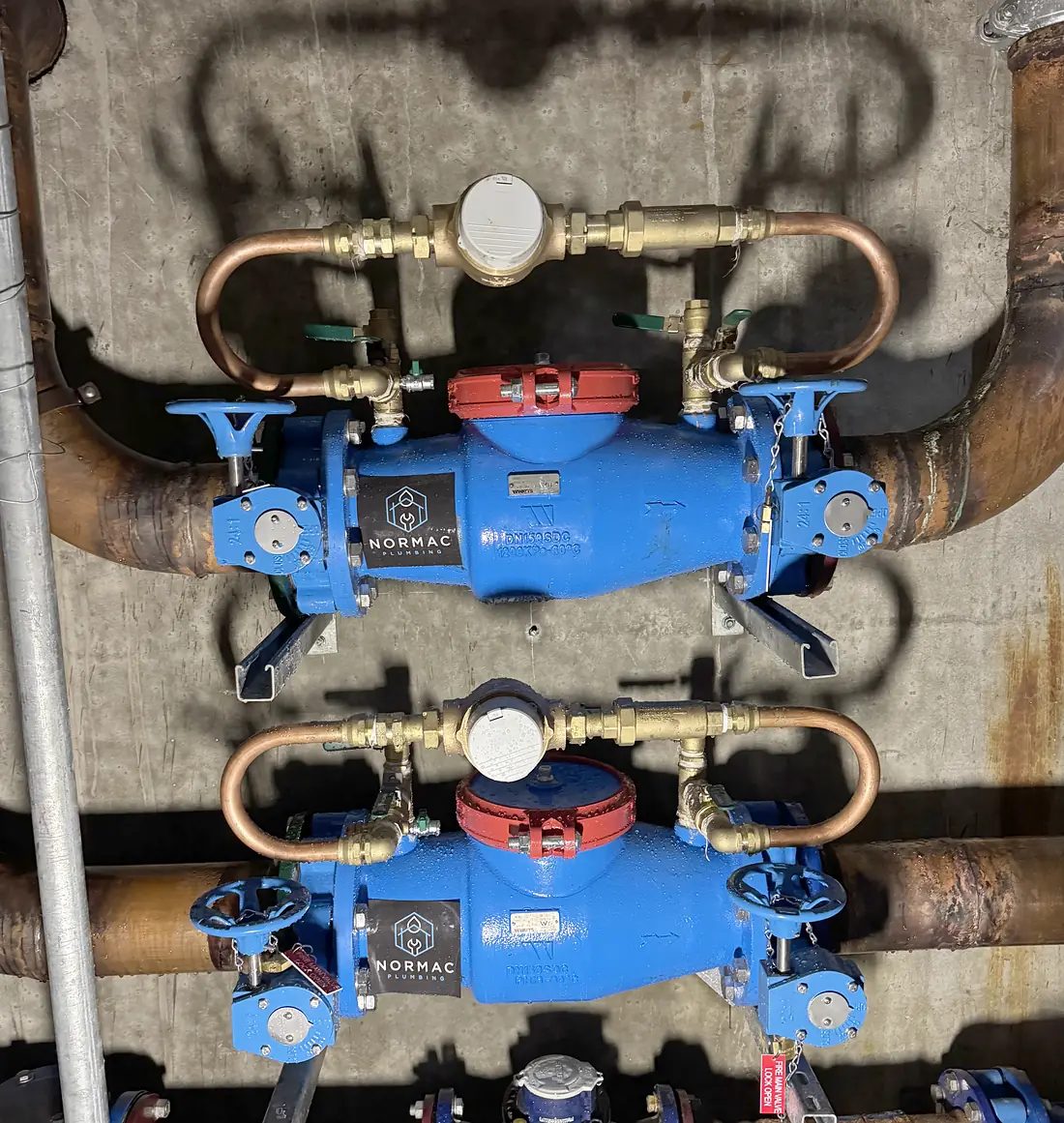 Twin DN150 backflow assemblies on a renewed water and fire service